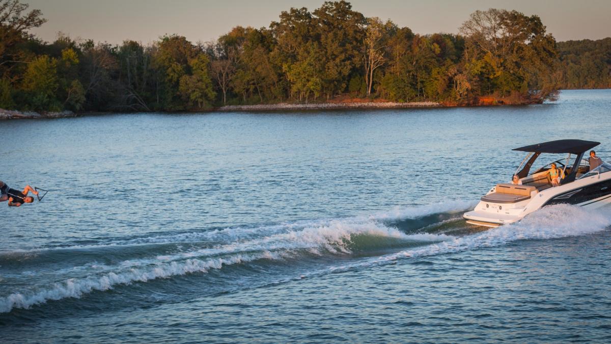 Wakeboarding behind the Sea Ray